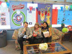 Three on a couch with yummy circus animal cookies-what a treat!