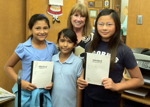 Students from kindergarten to 5th grade have fun with stories, writing, and drawing activities