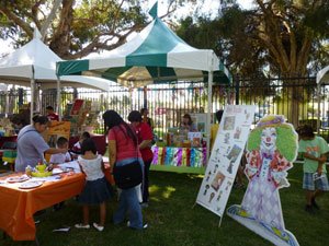 Alva alongside, Sheri Fink, author of The Little Rose, The Little Gnome, and Exploring the Garden with Little Rose.Books, crafts, and family fun all in one place at Alva's tent!